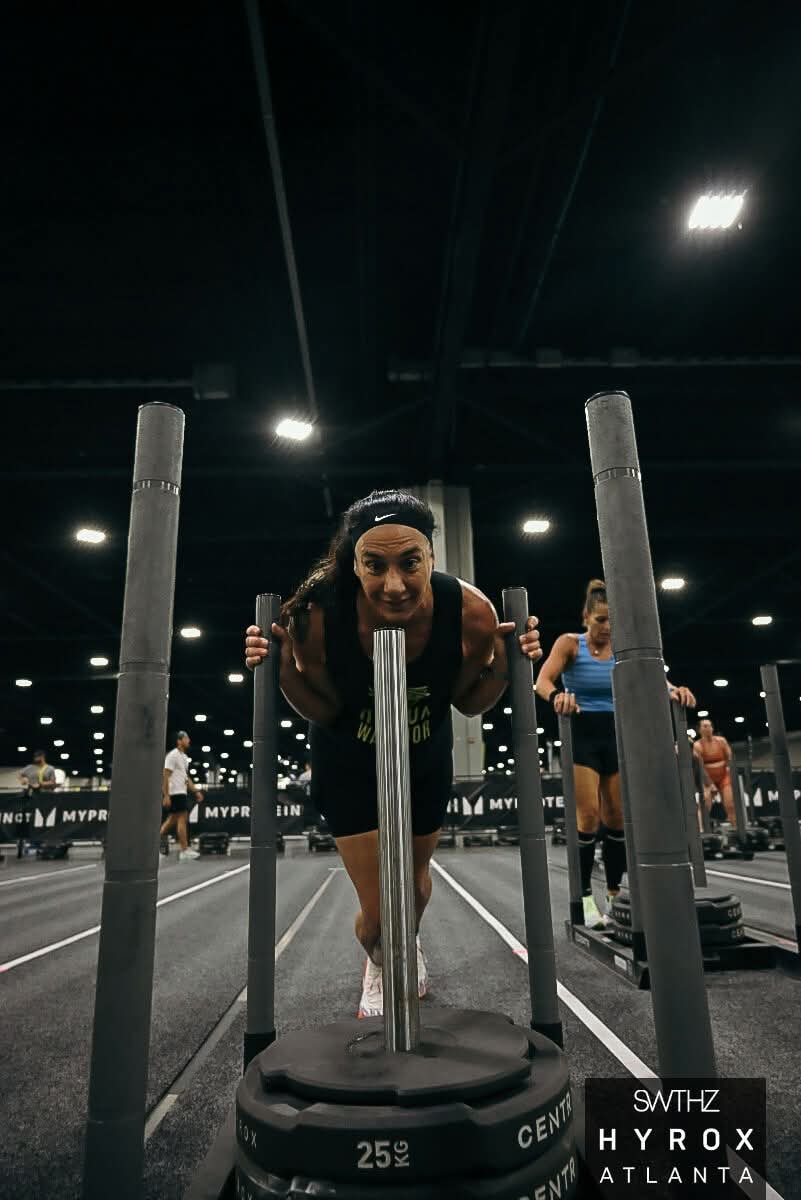 Athlete driving a sled during competition